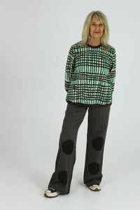 Green and brown stripes on cream loose fitting long jumper