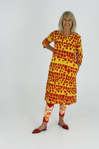 Red squares on yellow cotton jersey dress with 3/4 sleeves