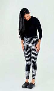 White vertical stripes on black cotton lycra leggings