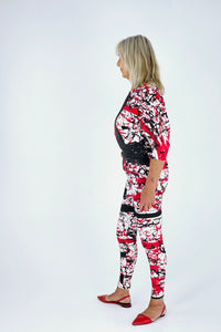 Black and red scribbles on white cotton lycra leggings